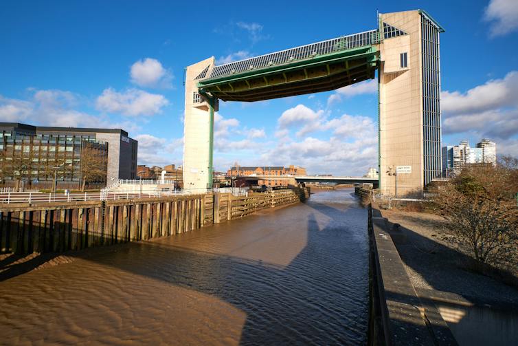 Barrier structure above river