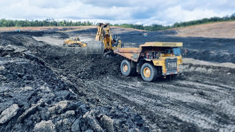 Trucks carrying coal from a mine